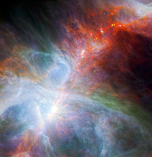 This new view of the Orion Nebula shows embryonic stars within extensive gas and dust clouds.